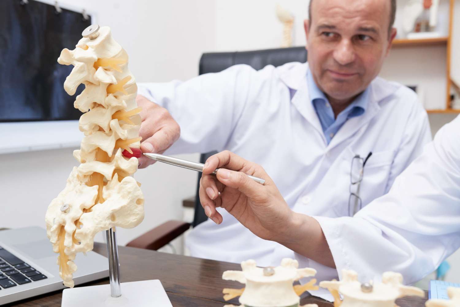 What are the Signs and treatments of Spinal Stenosis